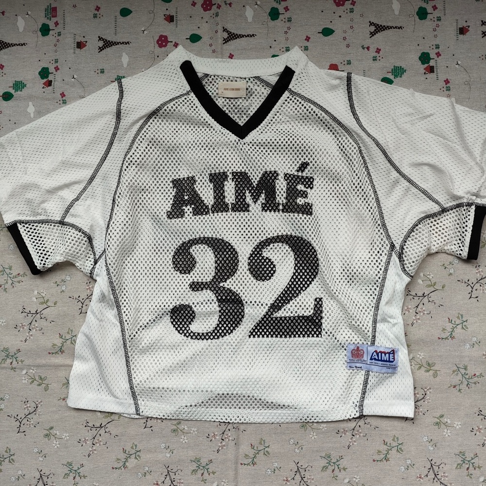 Aime Leon Dore White Mesh Jersey with Black Trim and Number 32